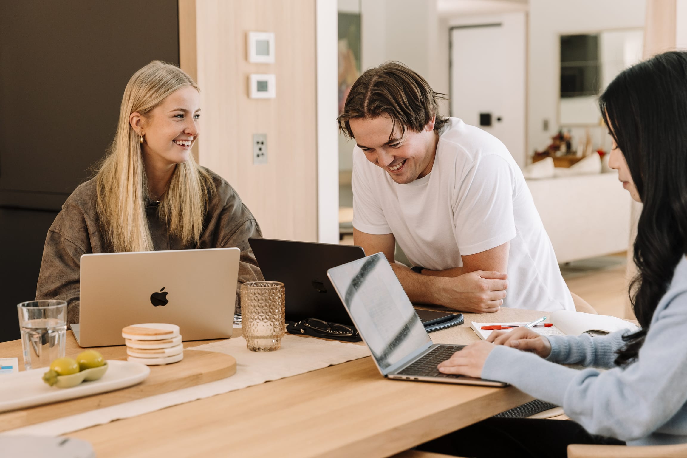The TMJ team collaborating around a table