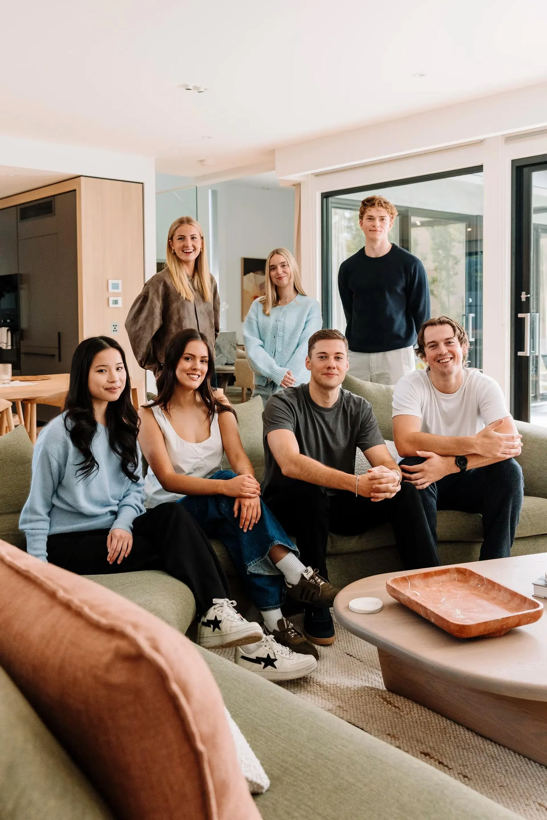 The T.M.J. team together in a Melbourne living room
